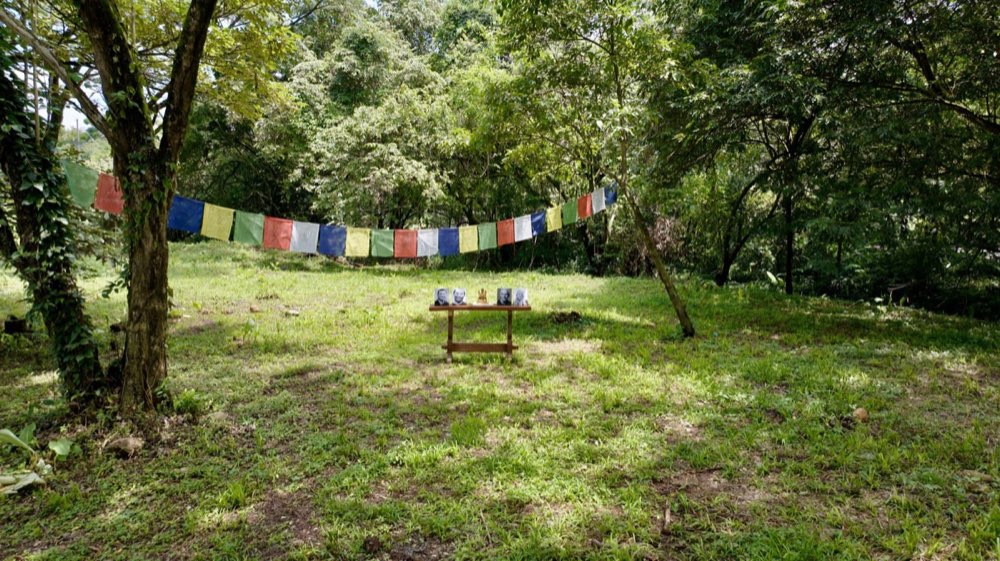 Prayer flags and altar at the land